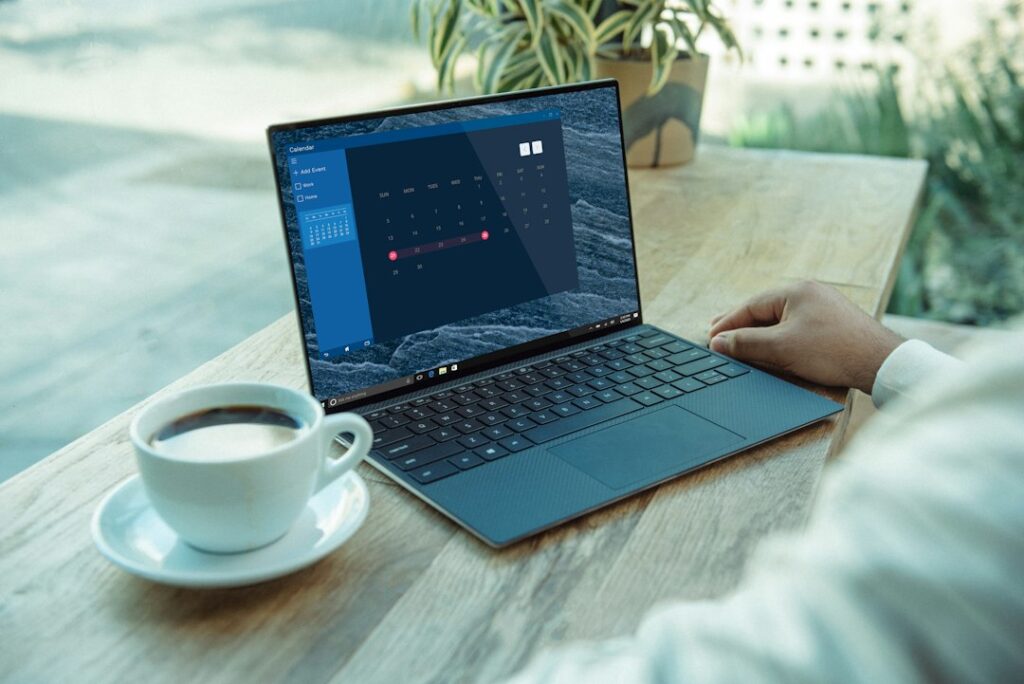 Simplifydiggs com Strategy: Building a Sustainable Content - person writing a content calendar on laptop