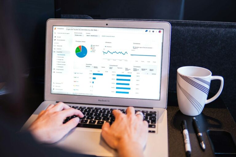 AI guest post research: 5 steps to find quality links - SEO professional reviewing data dashboard