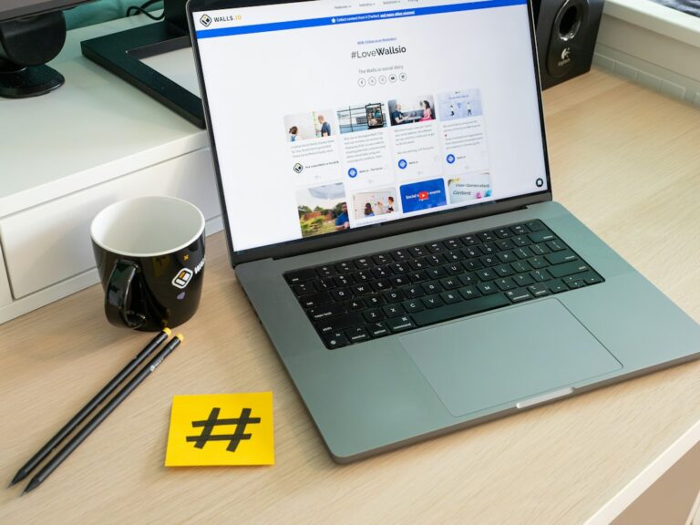 HashtagAI: How It Works and When to Use It - AI generating hashtags on laptop screen