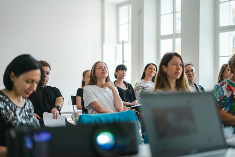 Professional Development: 5 Ways to Grow Your Career - professional taking a workshop
